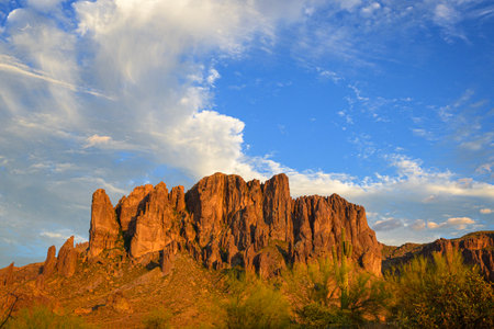 Sunset Superstition: Majestic Mountains, Blue Sky, and Desert Splendorの写真素材