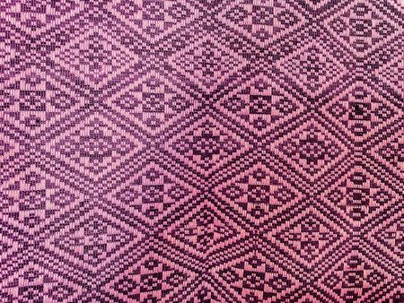 Thai silk handcraft,Thai style pattern on fabric backgroundの写真素材