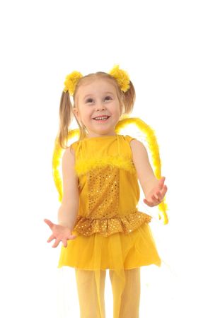 Girl angel in yellow on a white background. の写真素材