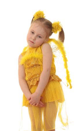 Girl angel in yellow on a white background.の写真素材