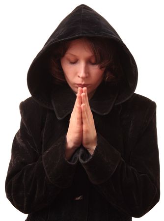 The Girl is prayed in black raincoat on white background. の写真素材