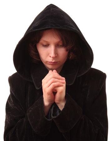 The Girl is prayed in black raincoat on white background. の写真素材