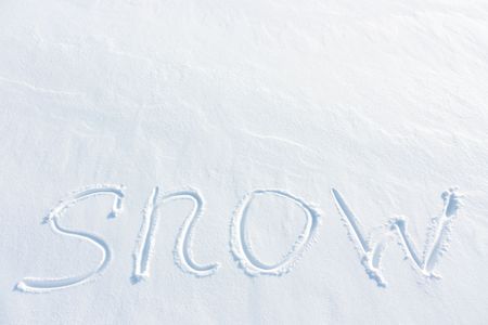 Snow - is the inscription on the snow.の写真素材