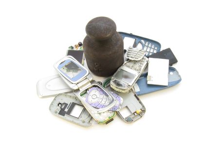  Broken mobile telephone by big weight.