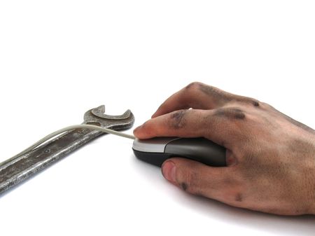 The Dirty worker of the hand has postponed the key and has taken the mouse.の写真素材