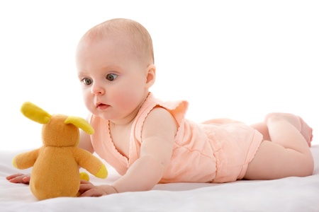 The kid with a toy in his hands.の写真素材