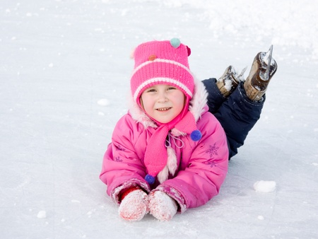 The girl in the skate on the ice.の写真素材