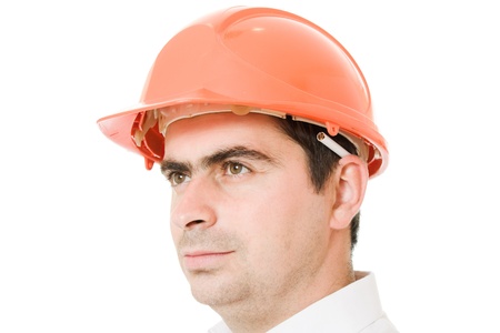 Businessman in a helmet with a cigarette.