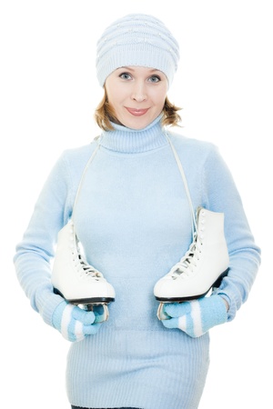 Woman with skates on white background.の写真素材