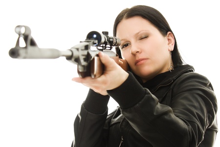 Cowgirl with a gun on a white background.の写真素材