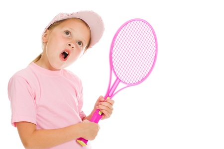 little girl with plays tennis  on a white backgroundの写真素材