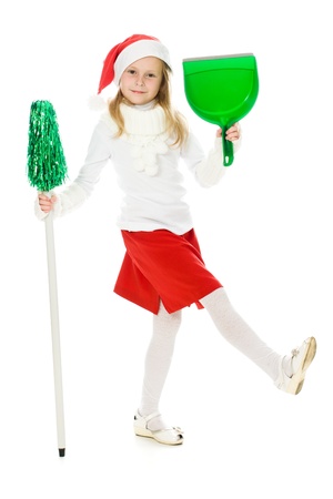 Cute little girl in the santa claus hat on a white background.の写真素材