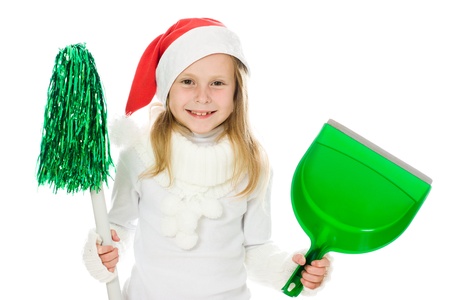 Cute little girl in the santa claus hat on a white background.の写真素材