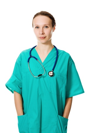 Beautiful woman doctor smiling on white background.の写真素材