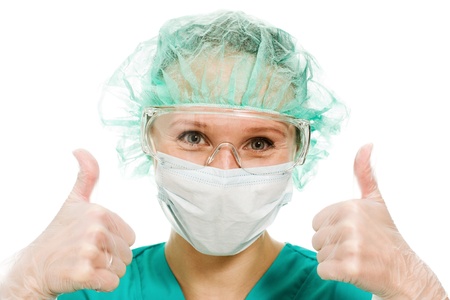 Surgeon woman showing okay gesture on white background.の写真素材