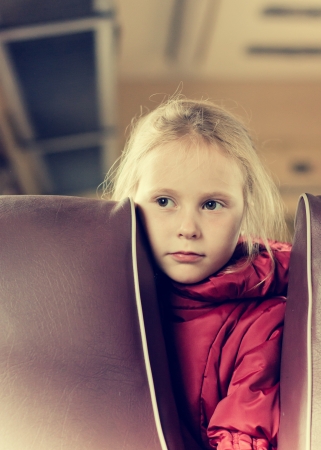 Lonely girl in a train of empty seats.の写真素材