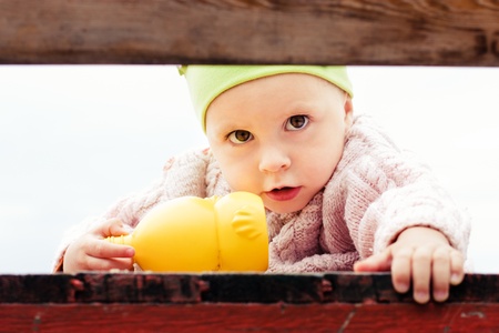 Restless baby one plays outdoor .