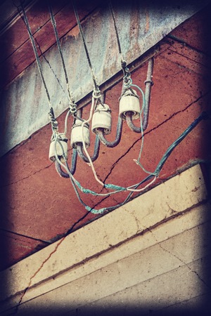 Ceramic insulators on the wall. Connection wiring.の写真素材