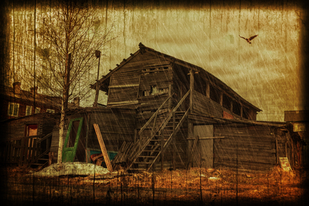 Old buildings in the abandoned town. Photos in a grunge style.の写真素材