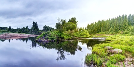 River in the forest on a summer day. Photos in HDR style.の写真素材