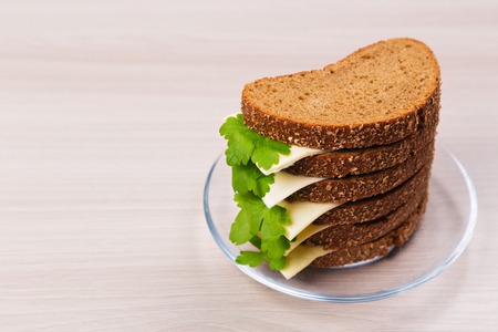 Bread with cheese and parsley on the table.
