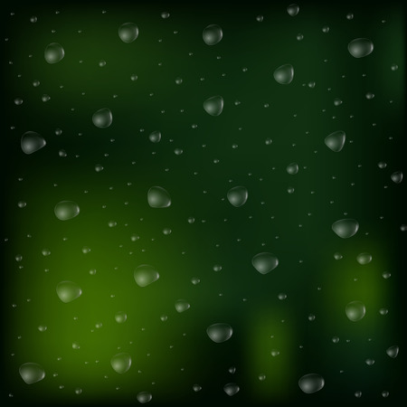 Drops of rain on an evening summer day on a glass of trees blurred green background.のイラスト素材