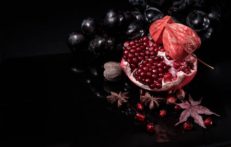 Perfect black and red composition with autumn fruitsの写真素材