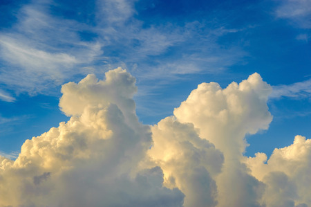 Beautiful white clouds in blue sky. Sunrise sky at summer time