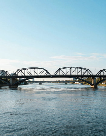 Railway bridge over the river in Riga, Latviaの写真素材