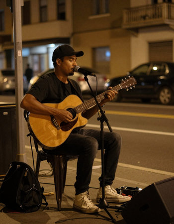 Guitarist playing on the street in Barcelona, Spain.