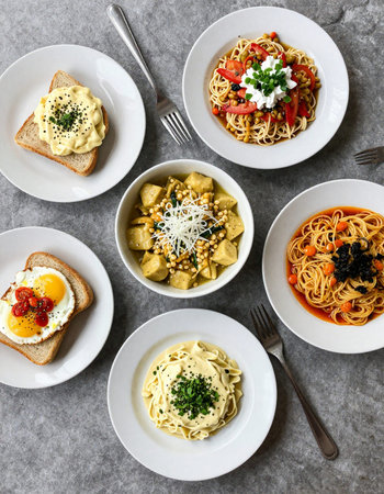 Selection of different types of pasta in bowls.の写真素材