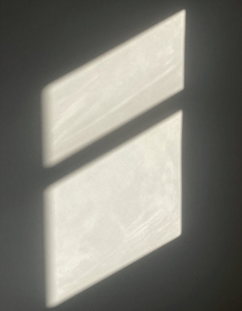 Shadow of window on the wall, close-up, horizontal image