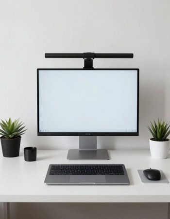 Modern workspace with blank screen computer on white desk and copy space.