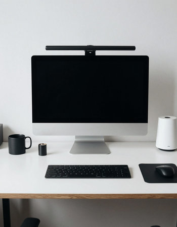 Modern workspace with computer, coffee cup and graphic tablet on white table