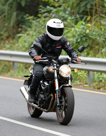 Rider on road no.1001 about 8 km from Chiangmai city, Thailand.