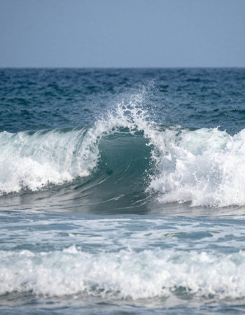 Waves breaking on the shore of the Mediterranean Sea in Israel.