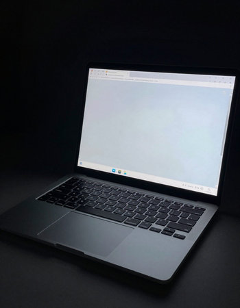 Laptop with blank screen isolated on black background, clipping path included