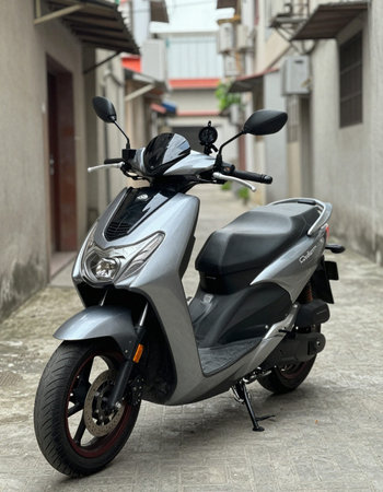 Black scooter parked on the street in the old town of Hanoi, Vietnam