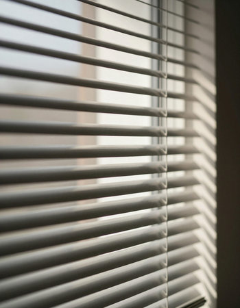 Blinds on the window in the morning. Selective focus.の写真素材