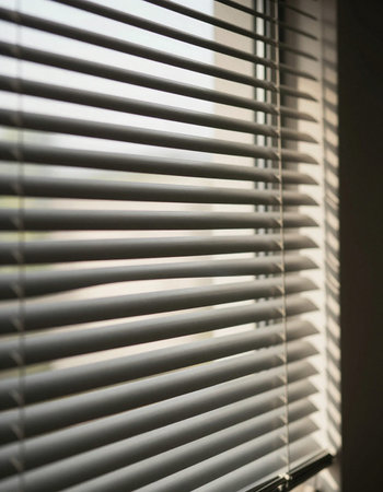 Blinds on window. Selective focus. Toned.の写真素材