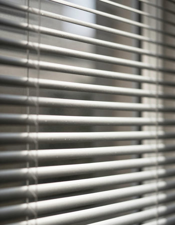 Close up of window blinds. Shallow depth of field.