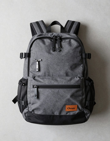 Backpack on a gray background. View from above. Place for text.