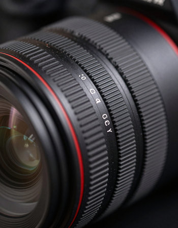 Close up of a professional camera lens. Shallow depth of field.の写真素材