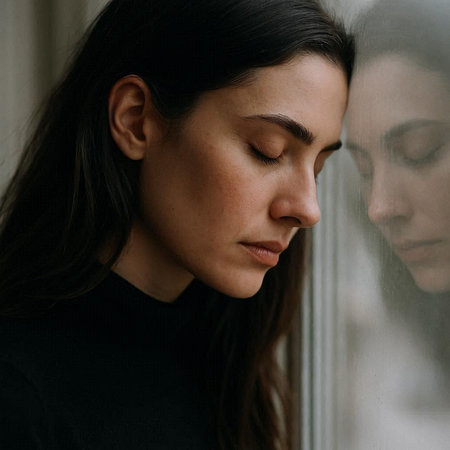 Portrait of a beautiful young woman with closed eyes looking out the window