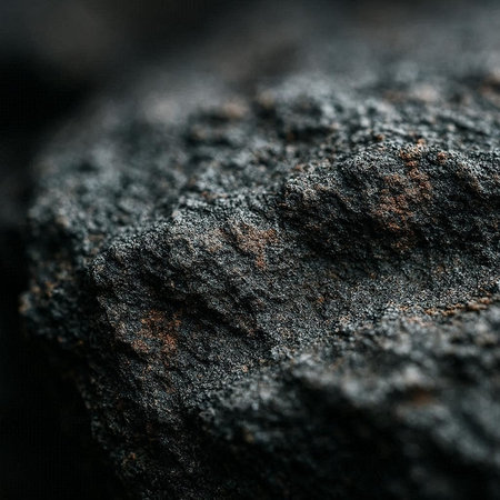 Close up of black coal. Selective focus. Shallow depth of field.