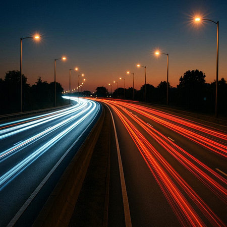 Car light trails on the road at night. Long exposure photo.の写真素材