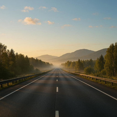 Asphalt road in the mountains at sunset. Beautiful nature landscape.