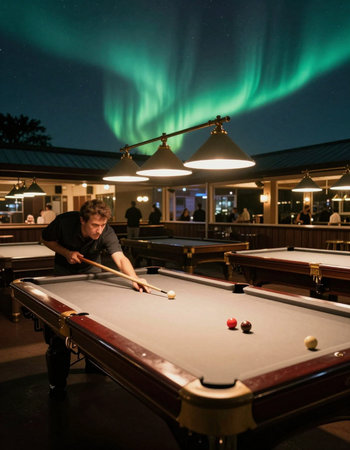 Young man playing billiards at night with Aurora Borealis in the background