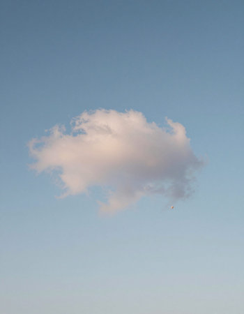white clouds in the blue sky, soft focus, and shallow DOF