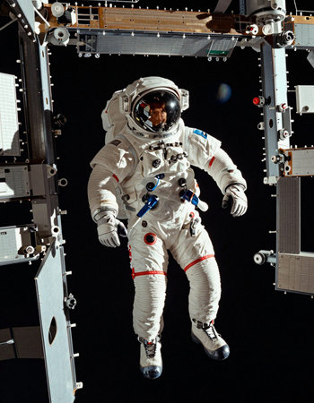 Astronaut spaceman do spacewalk while working for space station